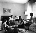 120px-Family_watching_television_1958